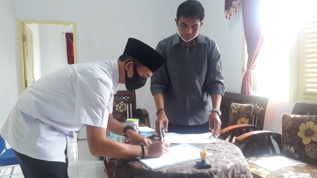 PENANDATANANAN MOU ANTARA PEMERINTAH DESA DENGAN WSM (WERAUSAHA SUKSES MANDIRI) TENTANG PENGELOLAAN SAMPAH